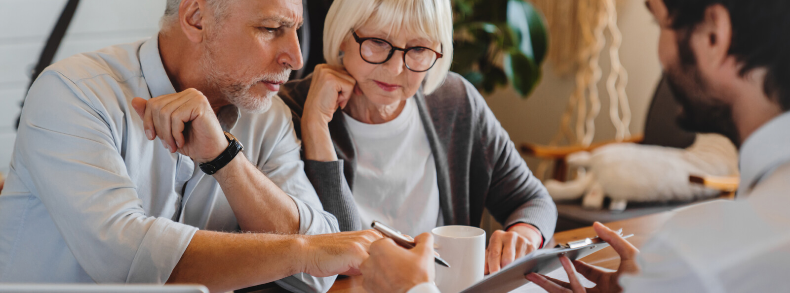 An older couple looking over documents