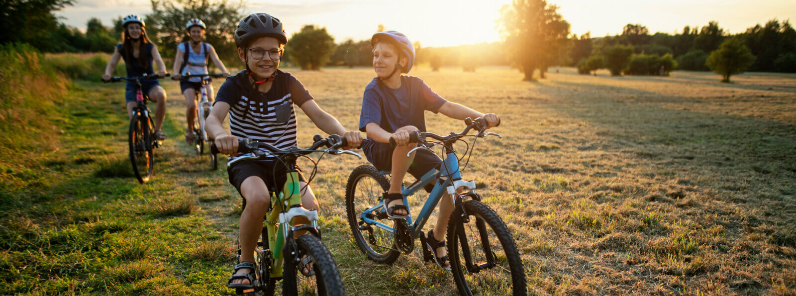 A group of kids riding bicycles